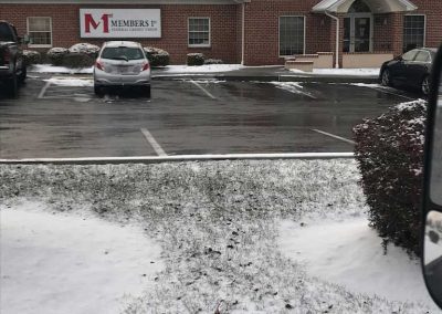 We offer commercial snow removal in harrisburg PA and surrounding areas, and this is an image of a business snow plowing job we performed during and after a snow storm. The image features the commercial building and is taken from the road.